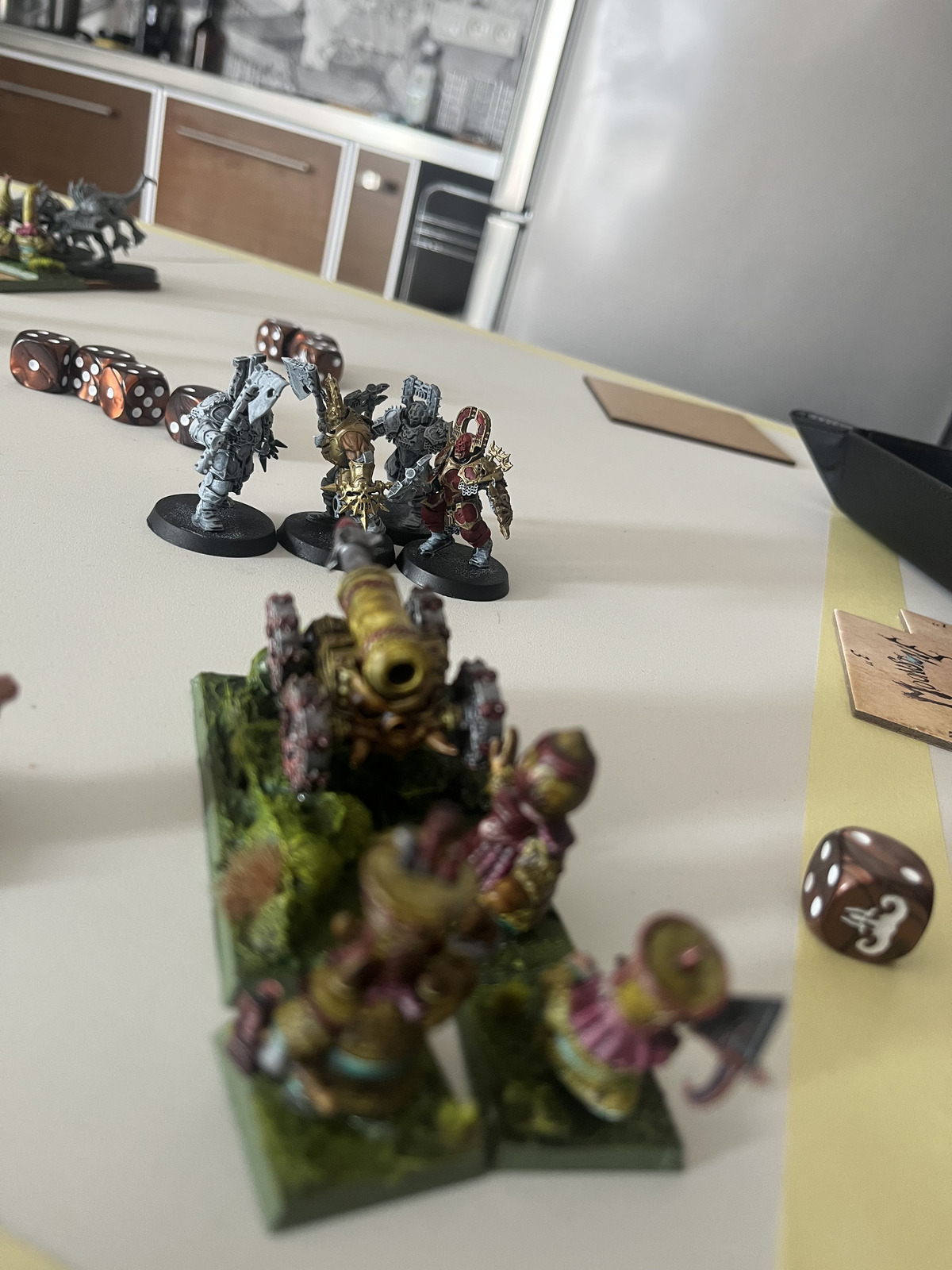 Chaos Dwarfs and Daemons facing off