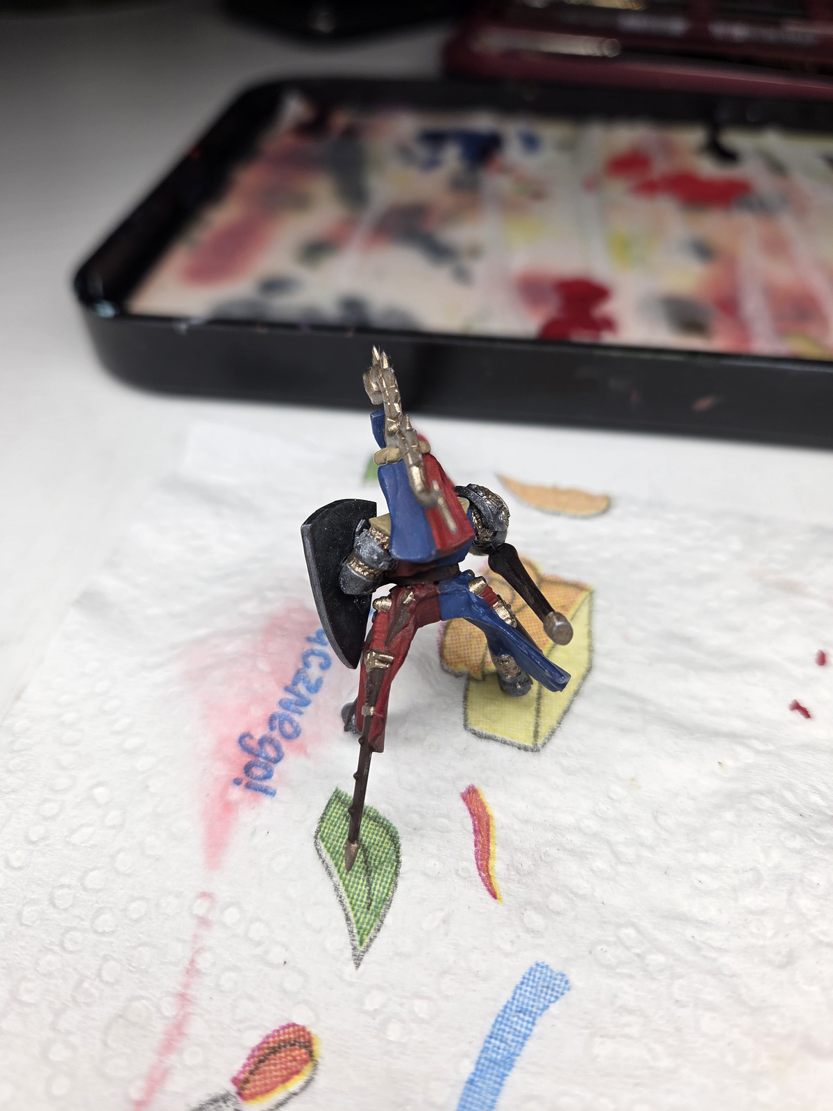 More progress on the armor and heraldry