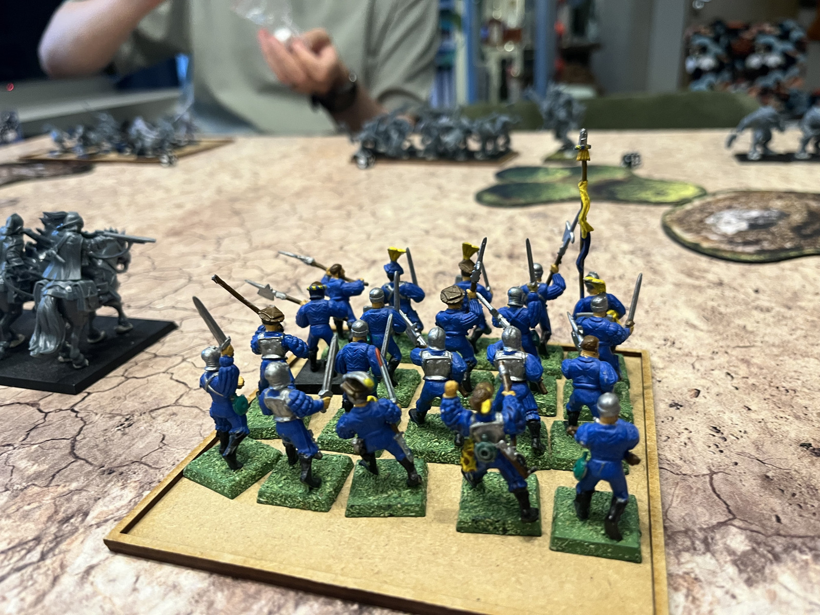 Wizard and sellswords advancing