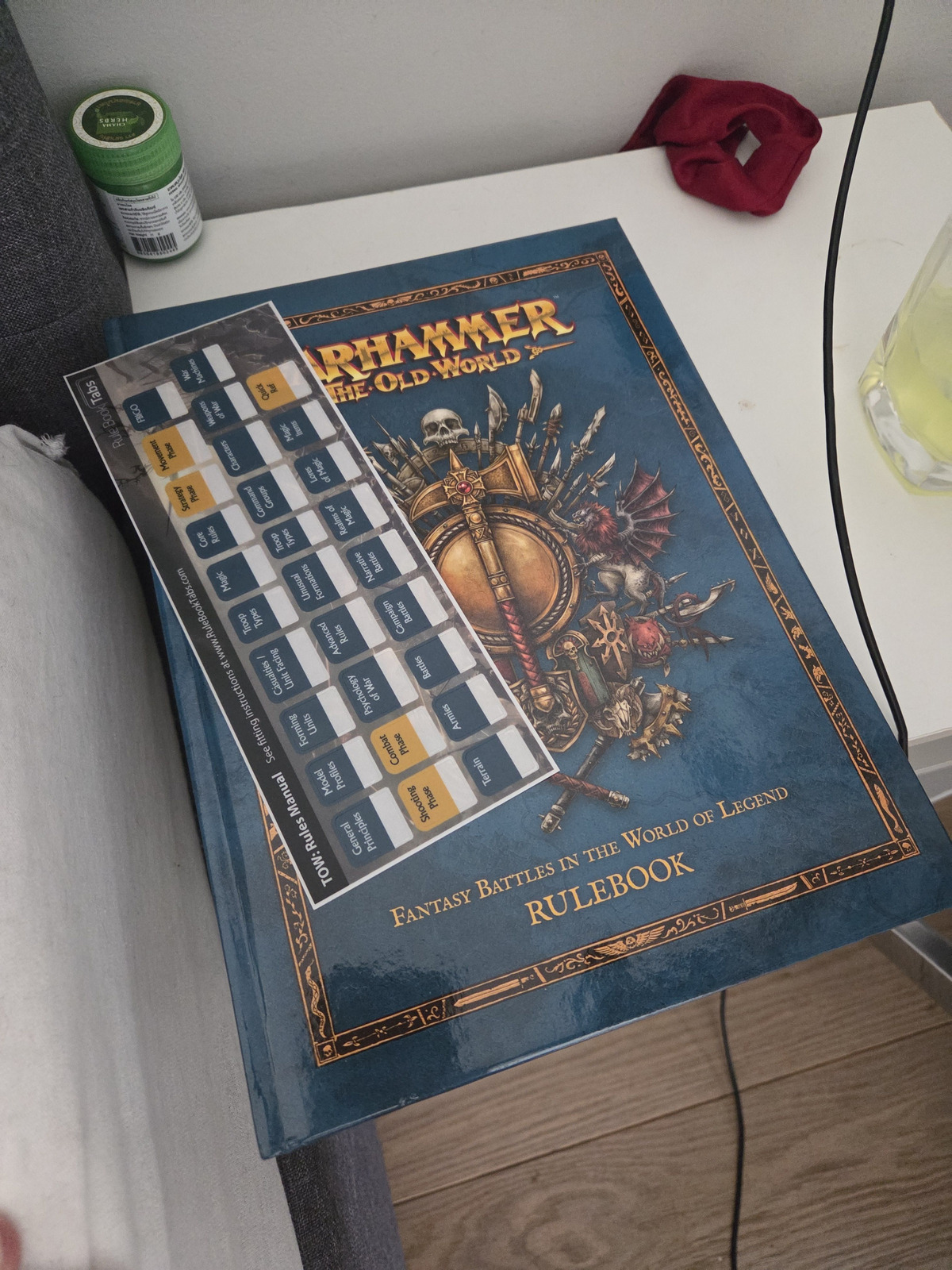 Rulebook with bookmarks ready for study