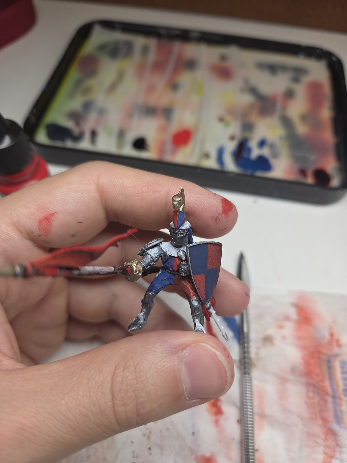 Close-up of the dual-color work and lance
